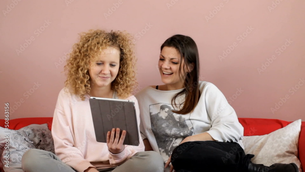 Two friends having video conversation by tablet - tracking shot Two friends having video conversation by tablet - tracking shot