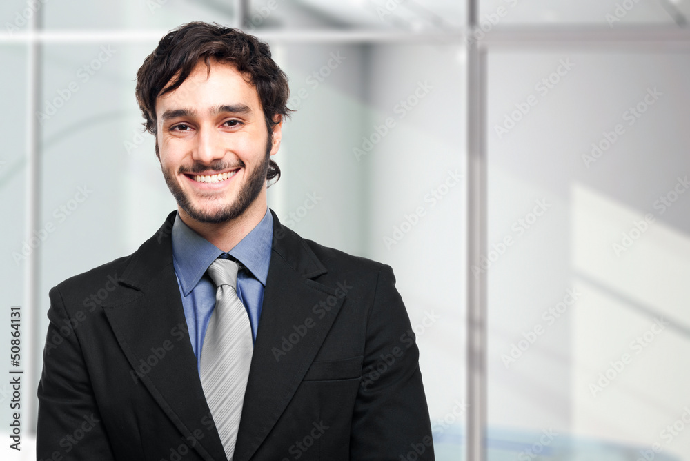 Confident businessman in his office