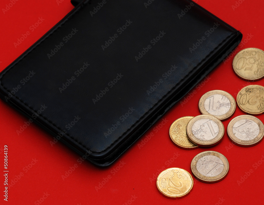 wallet with coins on a red background wallet with coins on a red background