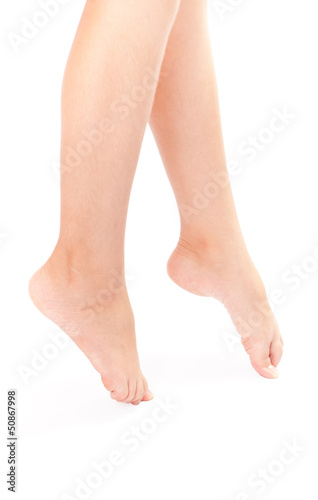 Fototapeta Naklejka Na Ścianę i Meble -  Long woman legs isolated on white