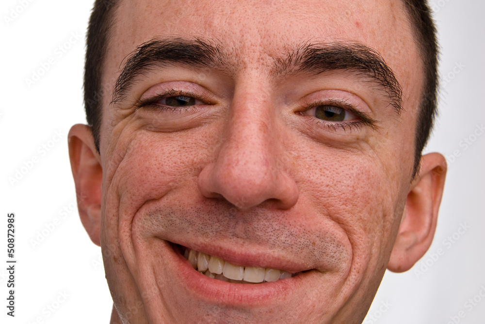 Caucasian Male Smiling Headshot - Extreme Closeup Caucasian Male Smiling Headshot - Extreme Closeup