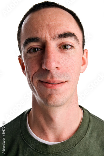 Caucasian Male Headshot with a smirk on his face