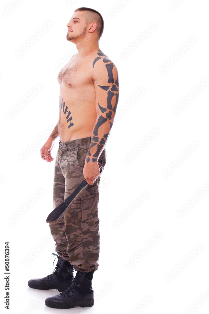 Russian guy watching somewhere while holding machete Russian guy watching somewhere while holding machete