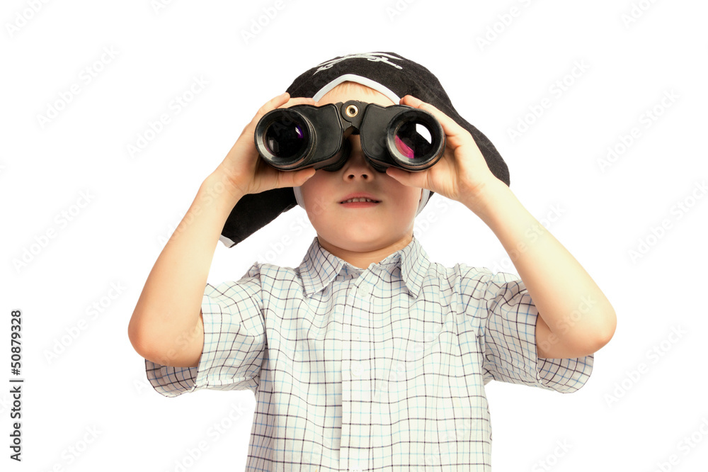 Child in pirate hat looking in binoculars Child in pirate hat looking in binoculars
