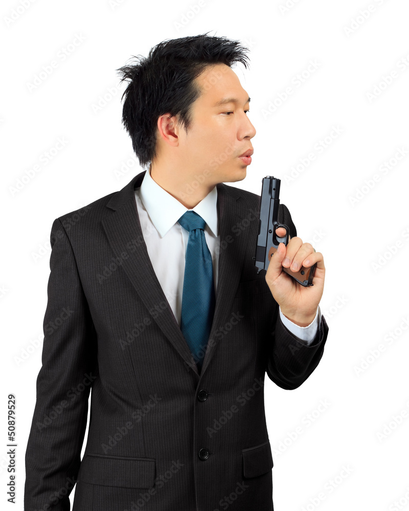 Asian male carry a gun on white