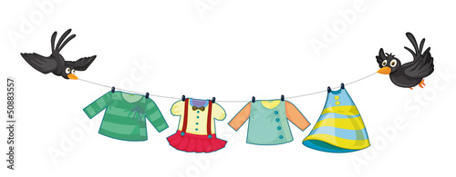 Hanging clothes with two black birds