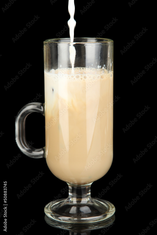 Cold coffee with ice in glass isolated on black Cold coffee with ice in glass isolated on black