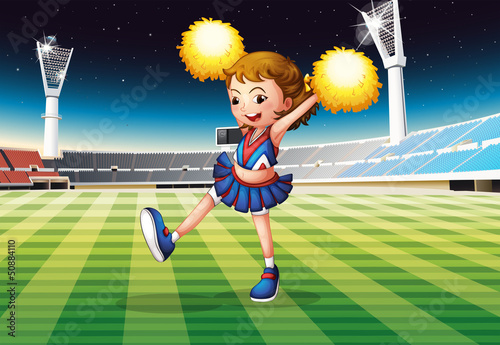 A cheerleader in the stadium