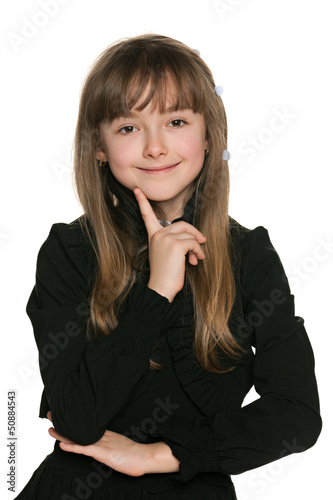 Smiling shy girl in black