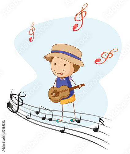 A kid playing with a guitar