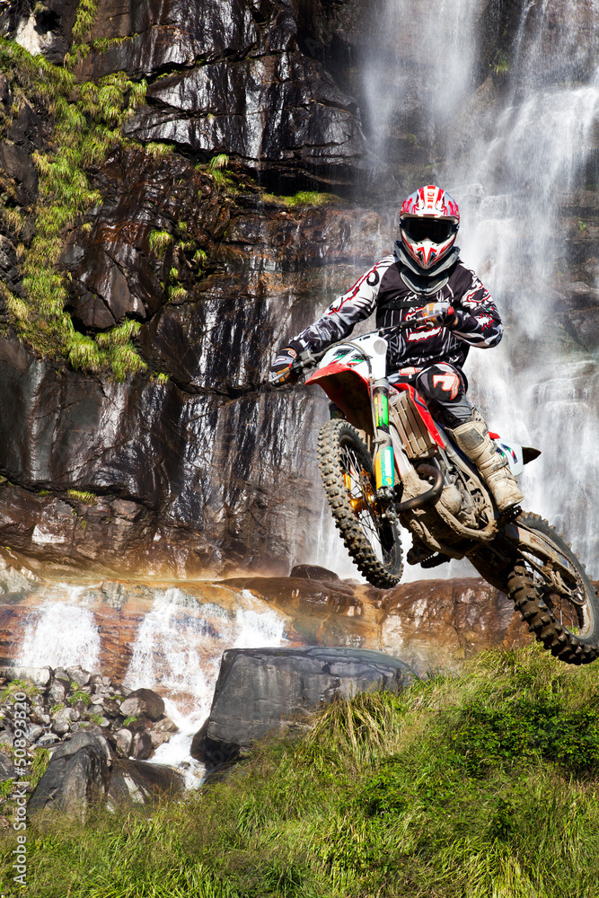 motocross with waterfall