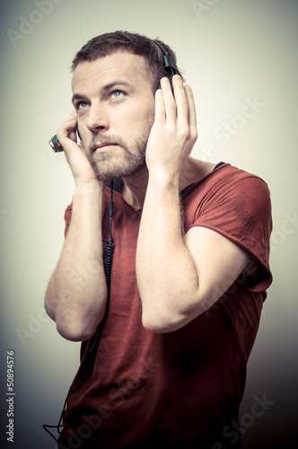 vintage portrait of fashion guy with headphones