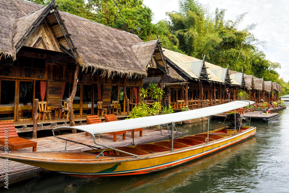 Tropical beach houses on the River Kwai in Thailand