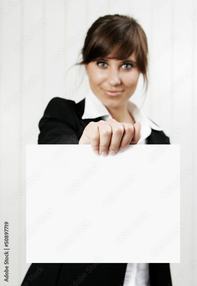 Smiling woman holding an empty card