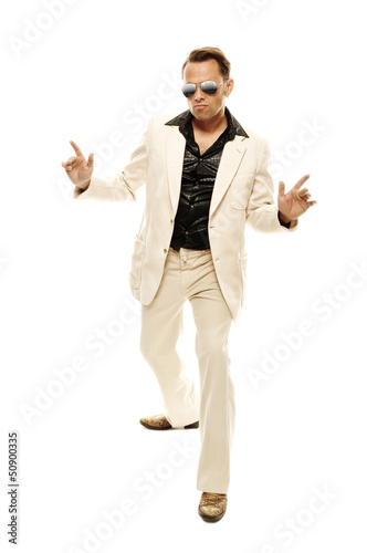 Mad disco dancer in white suit and snake leather boots photo