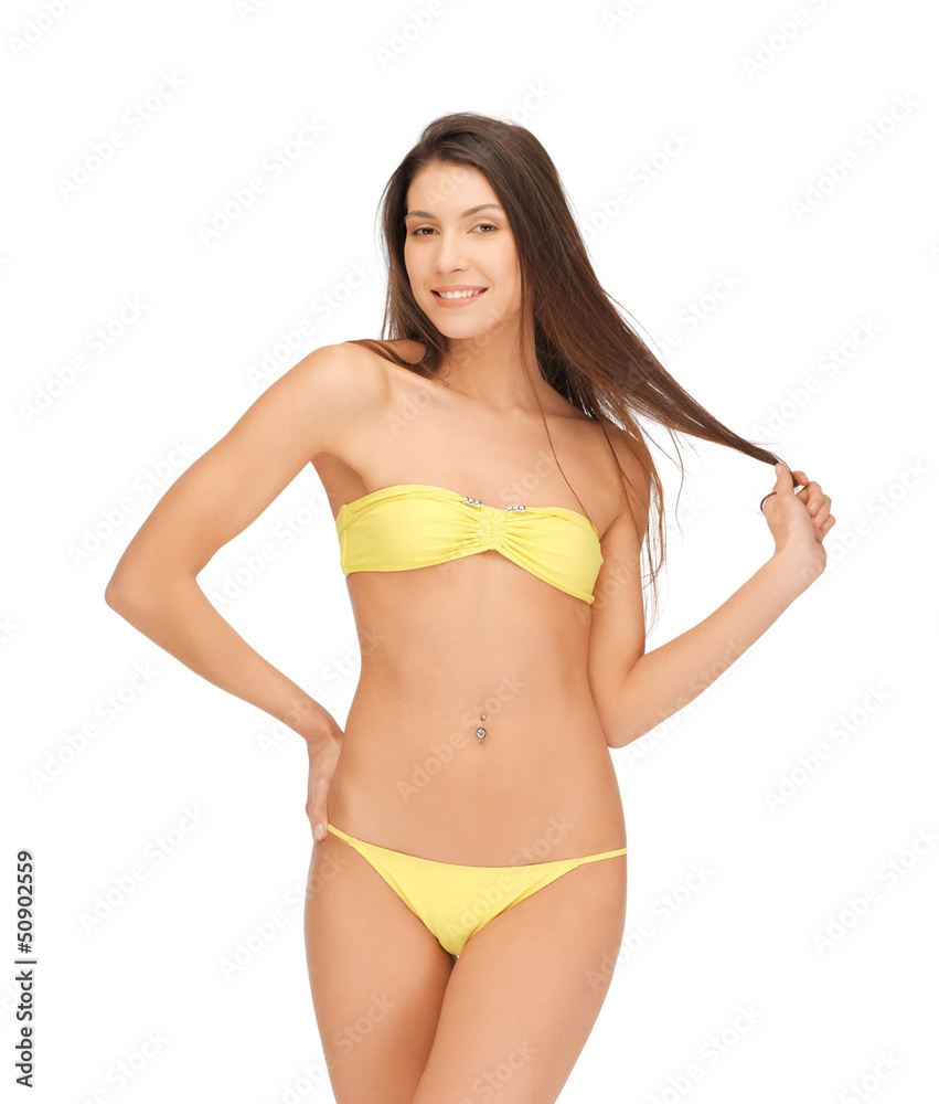 beautiful woman in bikini playing with hair beautiful woman in bikini playing with hair