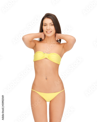 beautiful woman in bikini playing with hair © Syda Productions