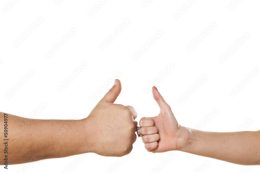 male and female hand with rihg showing thumbs up on white male and female hand with rihg showing thumbs up on white