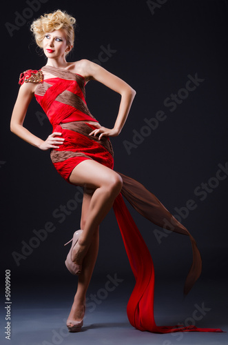 Woman in nice dress in studio