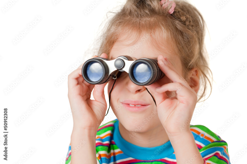 A girl looking through a small binocular isolated