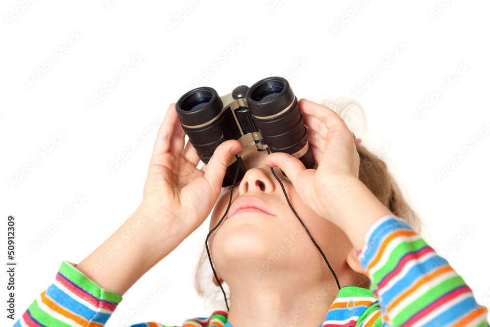 A girl looking up through a small binocular isolated A girl looking up through a small binocular isolated