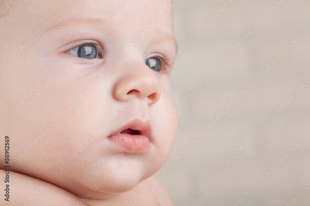 Close-up portrait focused kid with gray eyes. Close-up portrait focused kid with gray eyes.