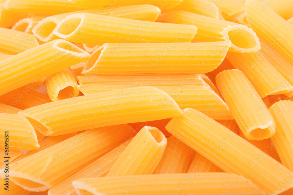 Pasta background, yellow macaroni, food ingredient photo Pasta background, yellow macaroni, food ingredient photo