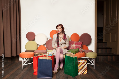 woman sitting on sofa photo