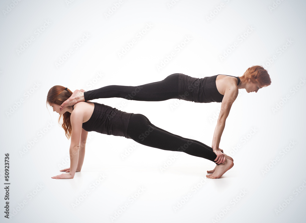 paired yoga on a blue background paired yoga on a blue background