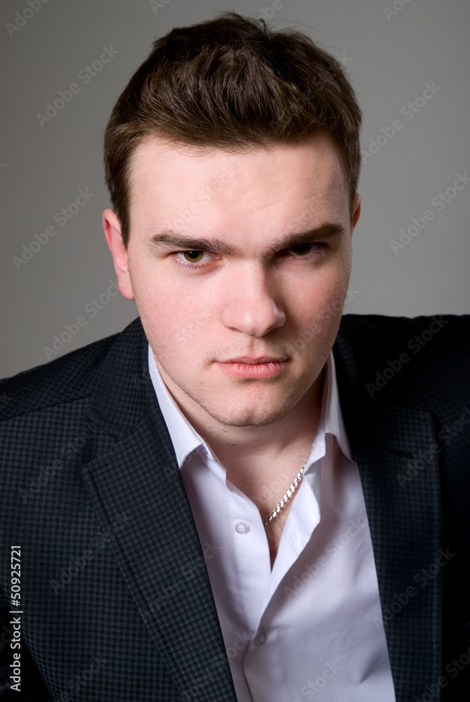 Close-up portrait of young confident businessman Close-up portrait of young confident businessman