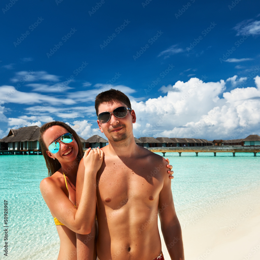 Obraz premium Couple on a beach at Maldives