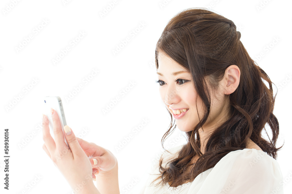 Beautiful asian woman using a cellular on white background Beautiful asian woman using a cellular on white background