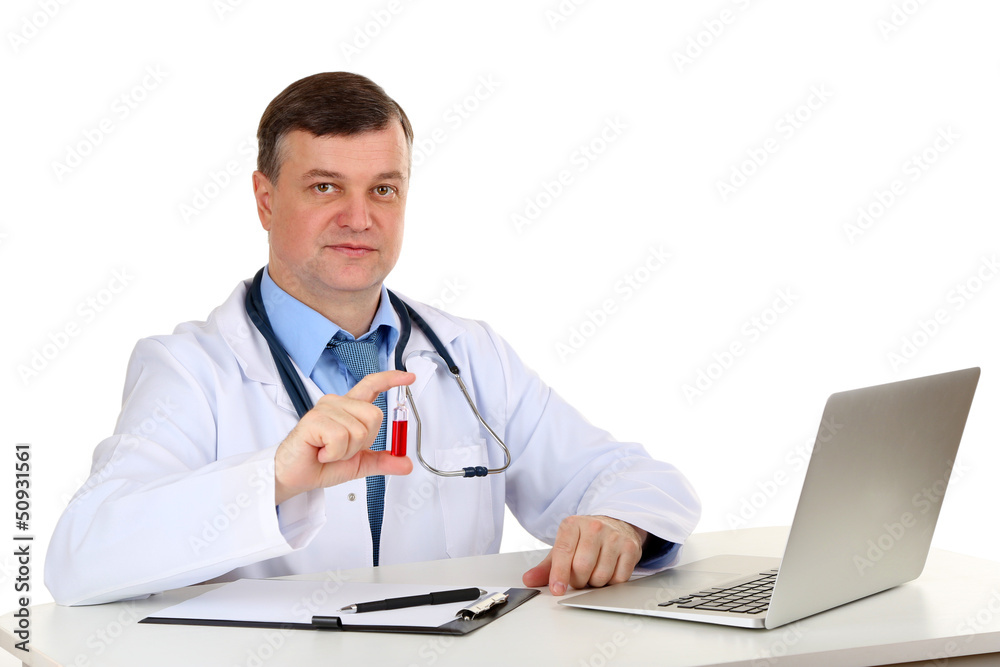 Medical doctor working at desk isolated on white Medical doctor working at desk isolated on white