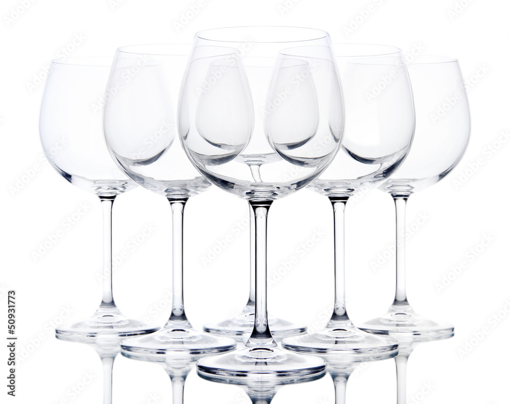 Empty wine glasses arranged and isolated on white Empty wine glasses arranged and isolated on white