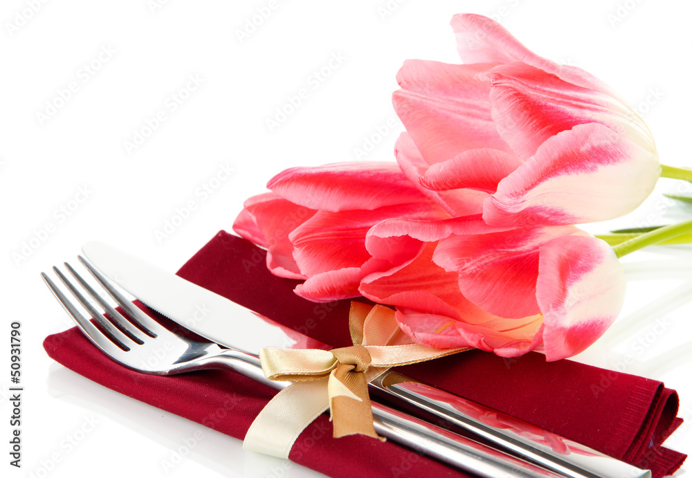 Festive dining table setting with tulips isolated on white