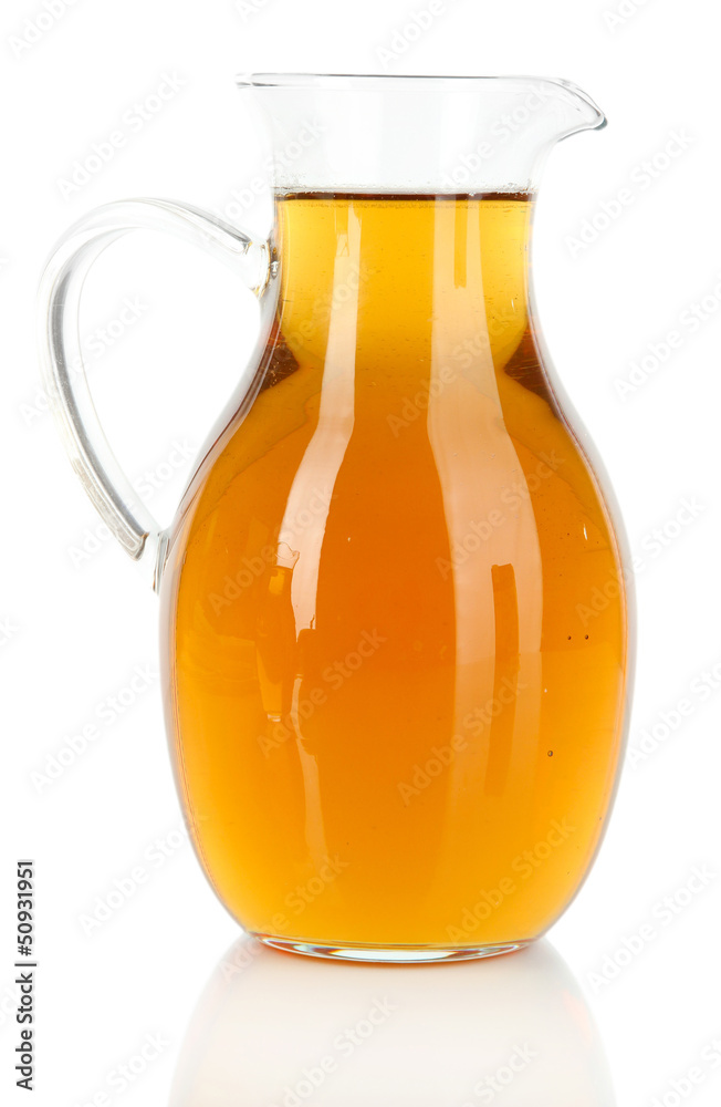 Apple juice in pitcher isolated on white Apple juice in pitcher isolated on white