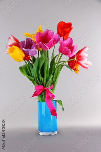 Wallpaper Mural Beautiful tulips in bouquet on gray background Torontodigital.ca