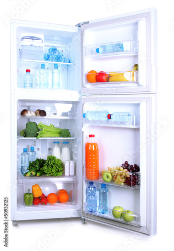 Open refrigerator with vegetarian food