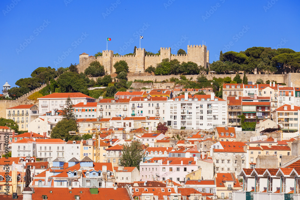Sao Jorge castle over the old rooftops of Lisboa, Portugal