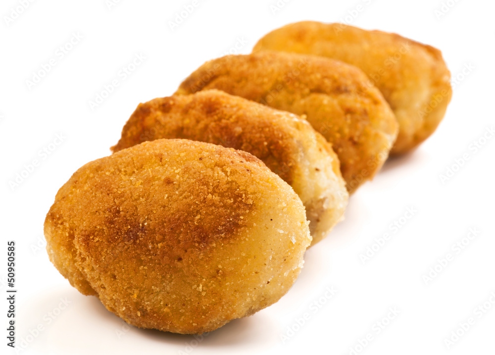 group filled with gold croquettes on white base