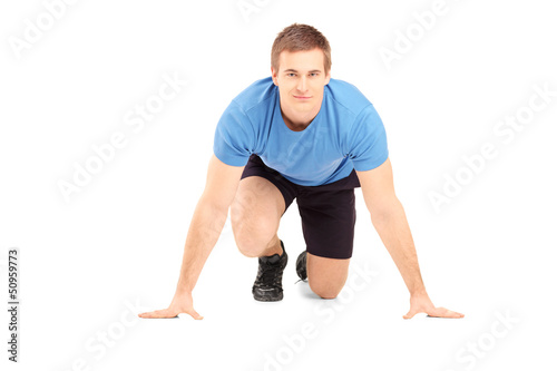 A male athlete ready to run