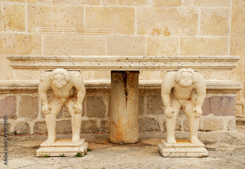 Картината върху платно Medieval table with caryatids