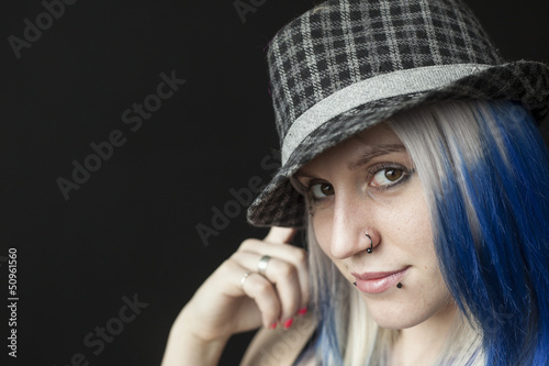 Beautiful Young Woman with Blue Hair and Herring Bone Hat