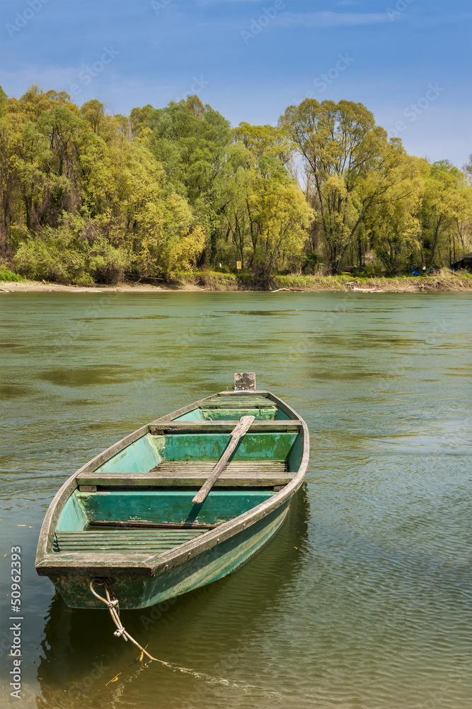 Two green boats in the river
