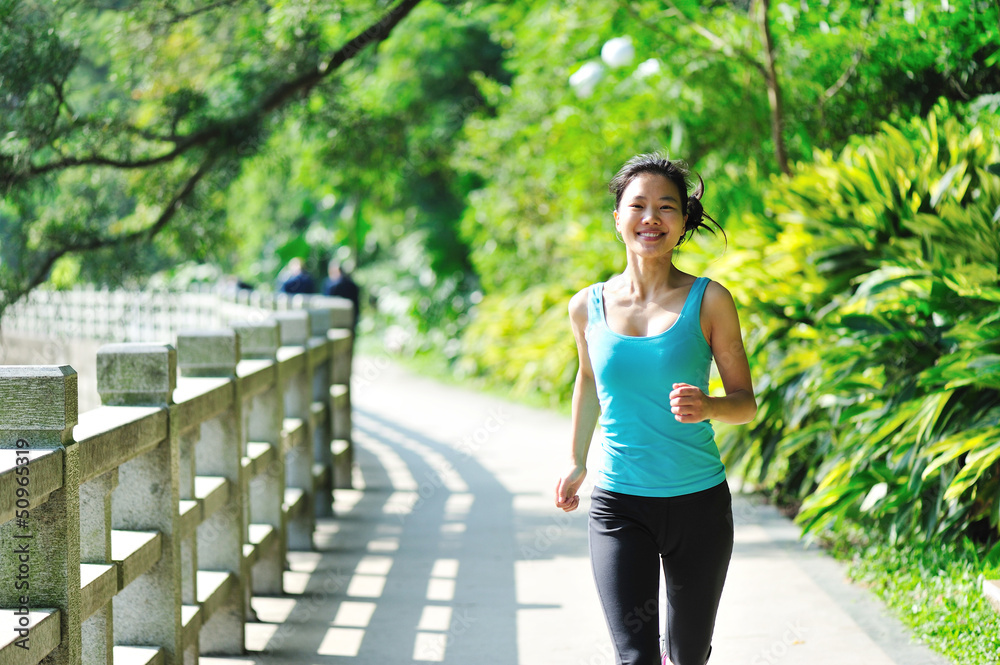 fitness healthy young asian woman jogging in park fitness healthy young asian woman jogging in park