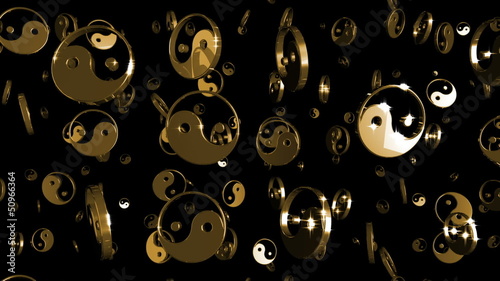 Looping Silver and Gold Yin-Yang Symbols Falling