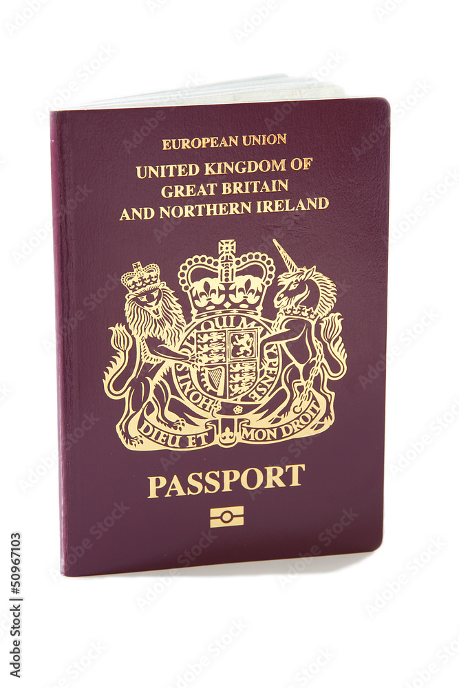 A United Kingdom passport against a plain white background A United Kingdom passport against a plain white background