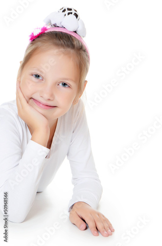 The beautiful little girl isolated on white