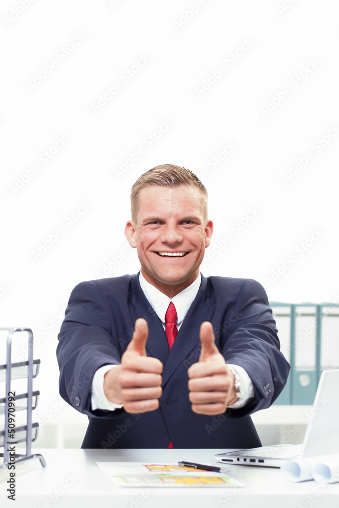 Businessman showing thumbs up Businessman showing thumbs up
