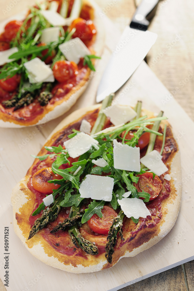 Food: Asparagus, rocket and cherry tomato pizza with Parmesan Food: Asparagus, rocket and cherry tomato pizza with Parmesan